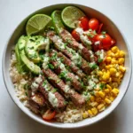 Cilantro lime steak bowl with colorful toppings
