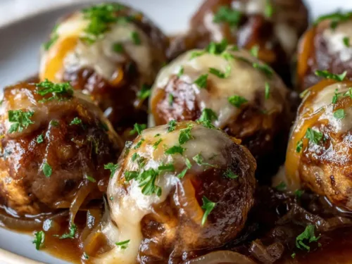 French Onion Meatballs with Savory Onion Sauce in skillet